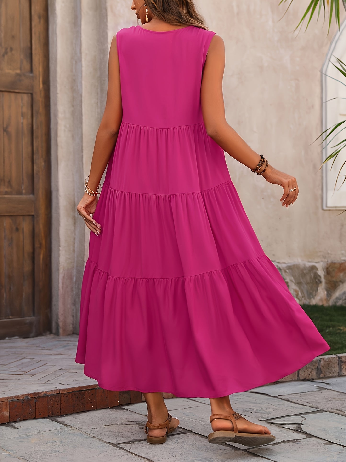 Élégante robe maxi vintage sans manches à col en V avec plis